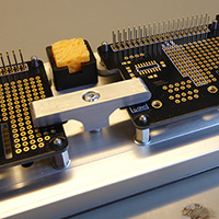 Click to view large image of PCB Clamps and solder cleaning sponge