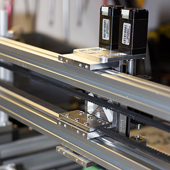 Pick and place X axis drive