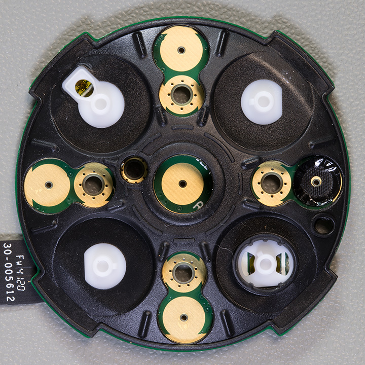 Top of the Switch PCB showing the four control switches and holes for the microphones