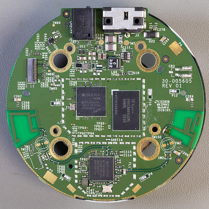 Top of the PCB with the metal shielding removed showing the main processor and ram