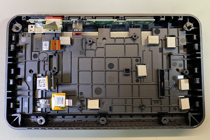 Main PCB removed from the front panel showing connectors and top button and camera PCB