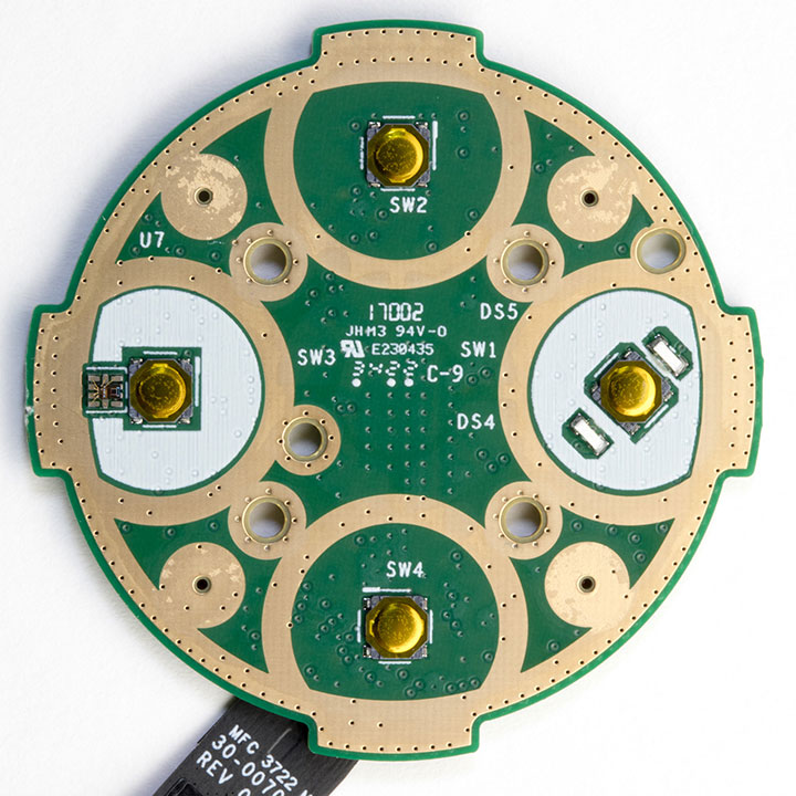 Top of the Switch PCB showing the four control switches and holes for the microphones