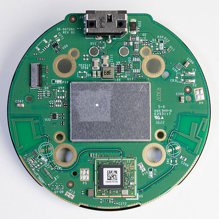 Top of the main PCB showing WiFi / Bluetooth IC at the bottom and shielding over the CPU and RAM