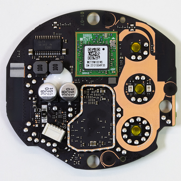 The upper of the main PCB shows the buttons, microphones and wireless module