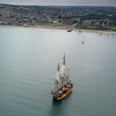 Shtandart in Swanage Bay with beach behind
