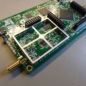 View the blog post for HackRF One SDR EMI Shield installation