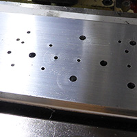 Click to view large image of Holes drilled in 10mm